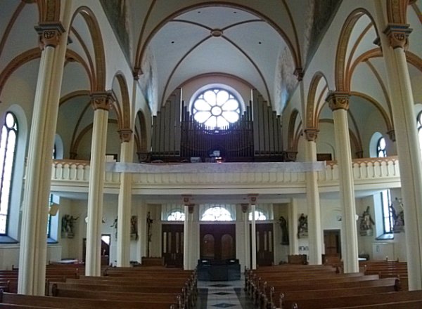 Wide view of St. Anthony's choir loft and organ.